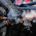 Protes meletus di seluruh Indonesia setelah pengemudi layanan transportasi online tewas dalam demonstrasi